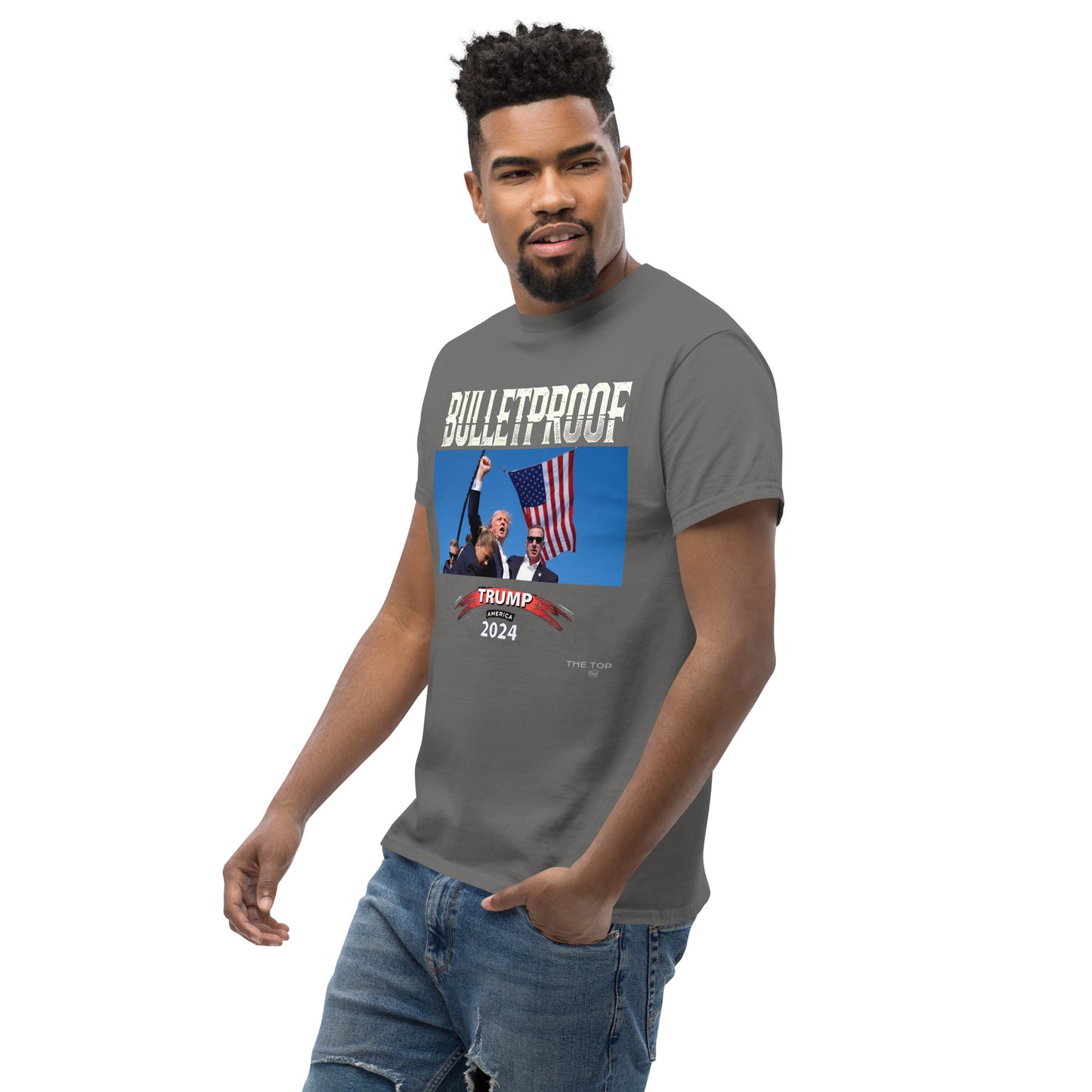 TRUMP Large Logo Stand Strong Unisex Tee: Triumph in the Face of Adversity