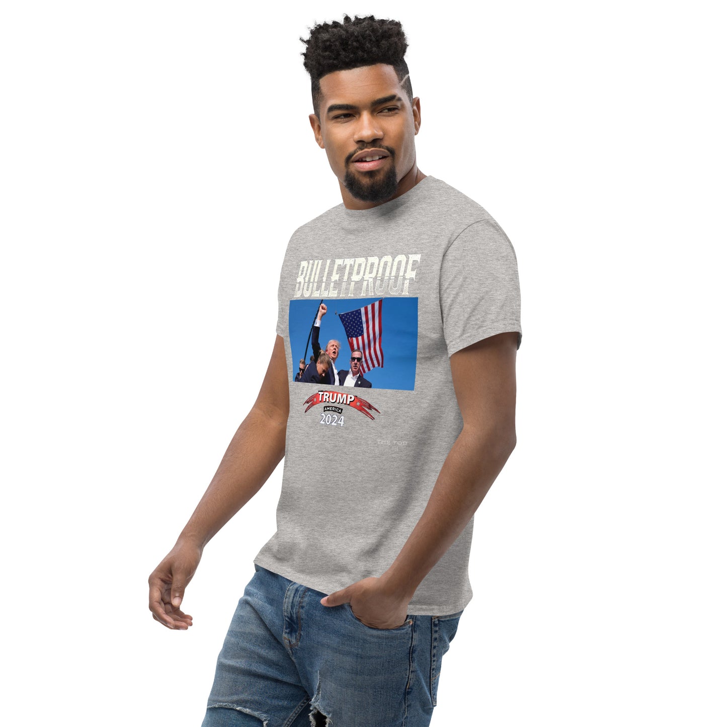 TRUMP Large Logo Stand Strong Unisex Tee: Triumph in the Face of Adversity